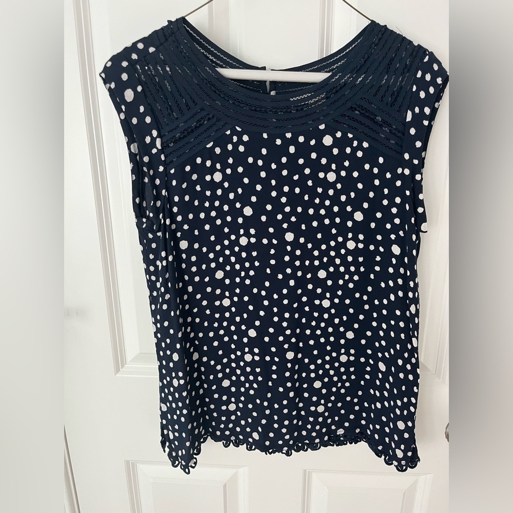 Navy with cream polka dots, crochet accents.
